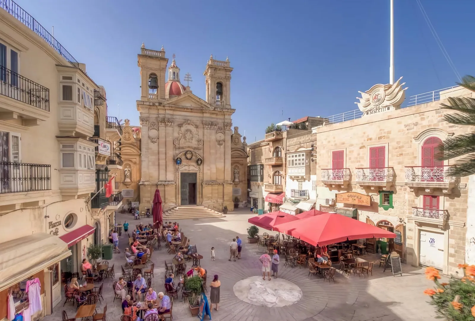 Busy square in Victoria on Gozo in front of the parish basilica