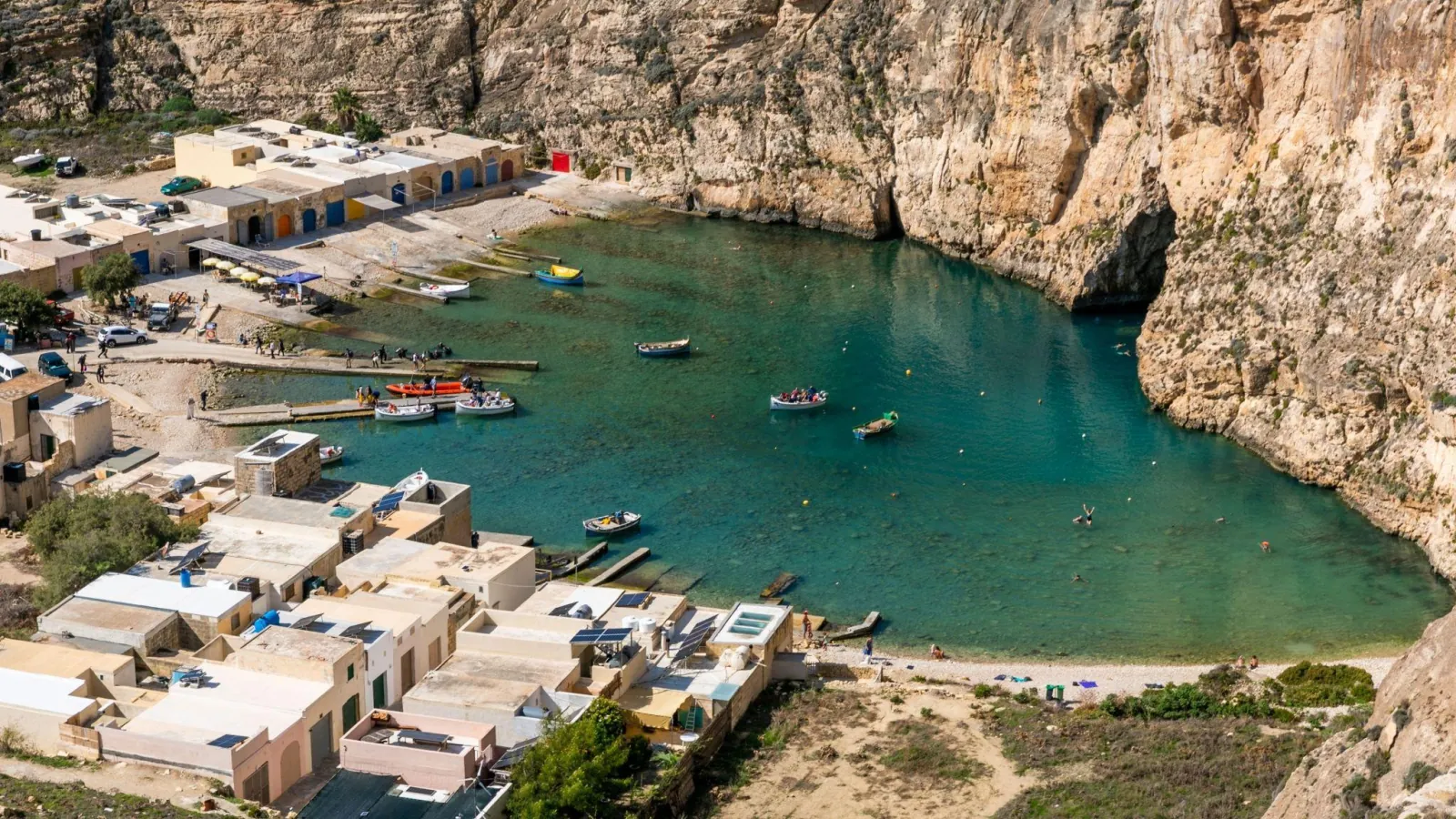 Aerial view of Xlendi Bay and its waterfront on Gozo