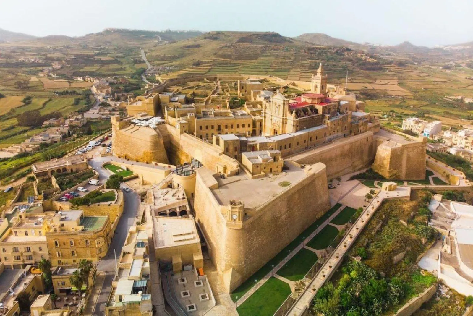 Aerial view of the Cittadella fortress and its gardens above Victoria