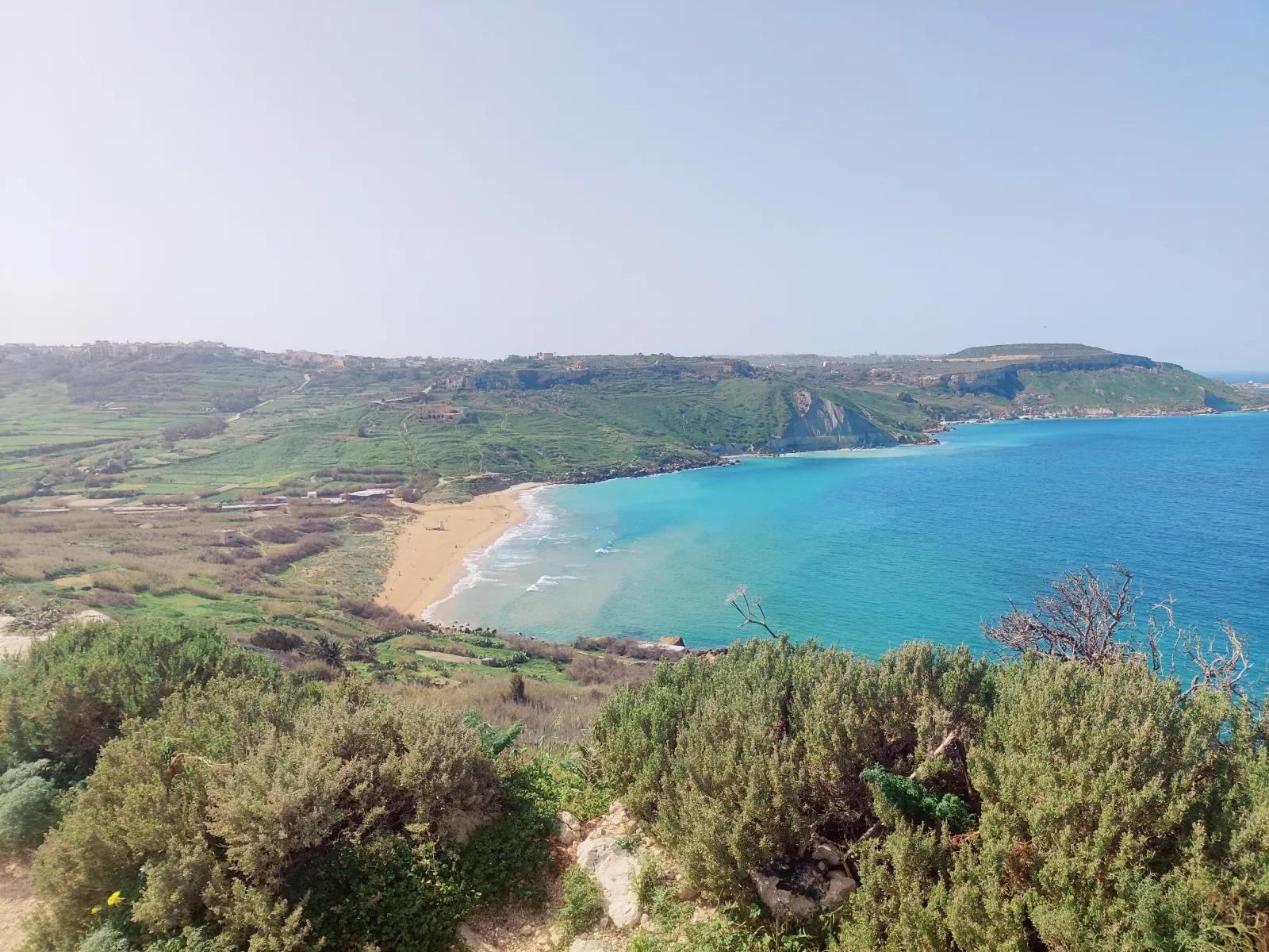 Aerial view of Ramla Bay and its red sand beach on Gozo