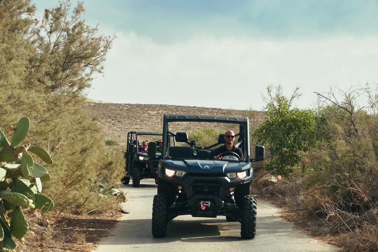 UTV on a dirt track through Gozo scrubland on a sunset tour