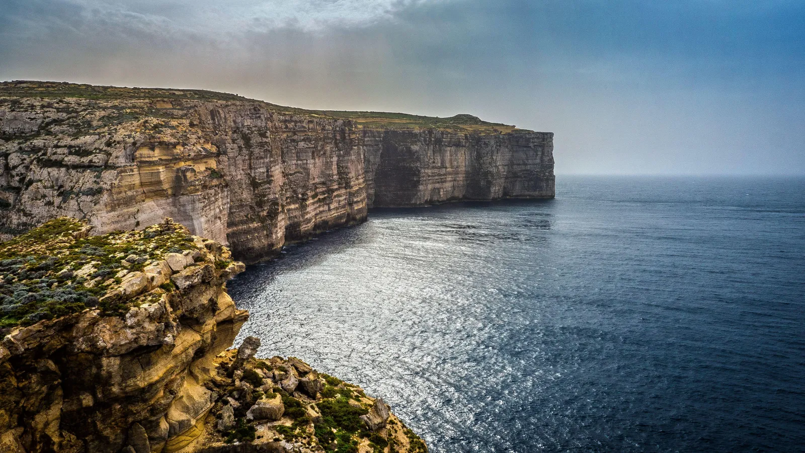Gozo's limestone cliffs dropping into the sea on the island's west coast